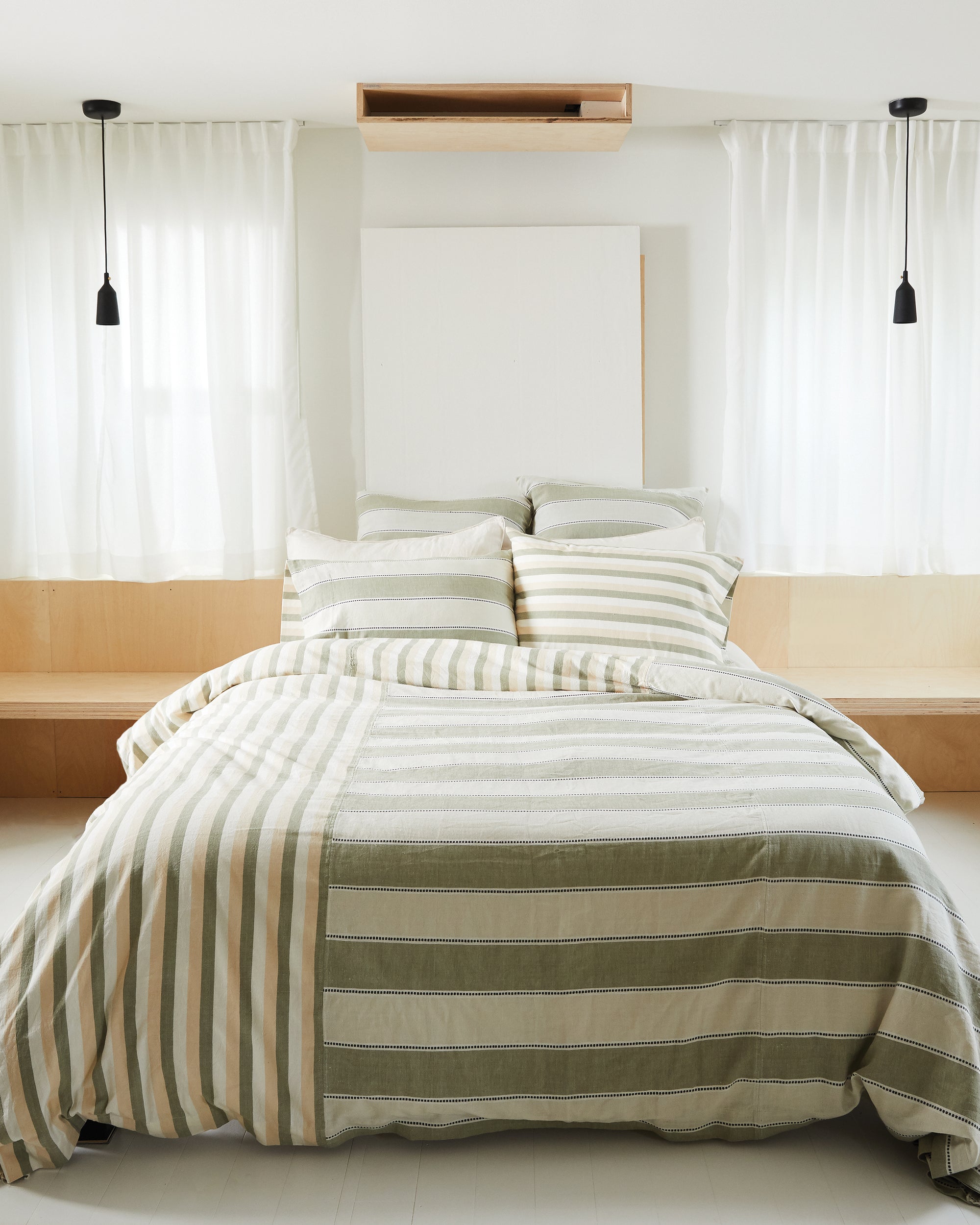 ethically handwoven oeko-tex cotton bedding designed by MINNA in sage colored neutral stripes