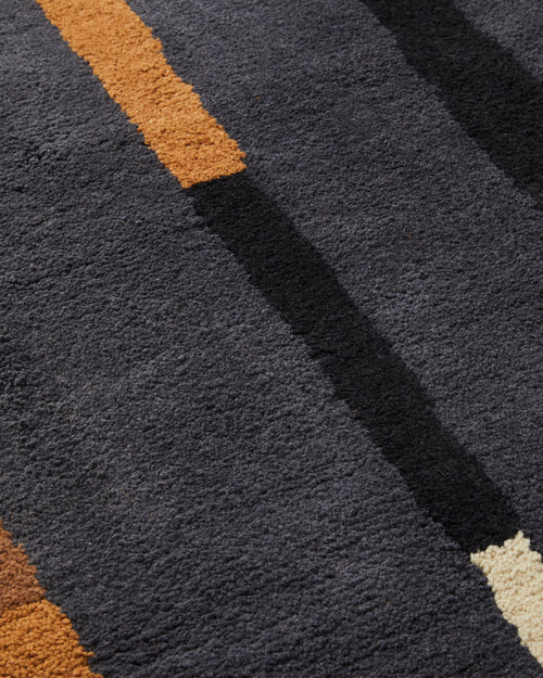 close-up of ethically handwoven plush pile weave MINNA Lines Pile Rug in Dusk, Deep Blue