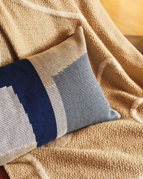 detail of ethically backstrap woven decorative throw pillow in blue 