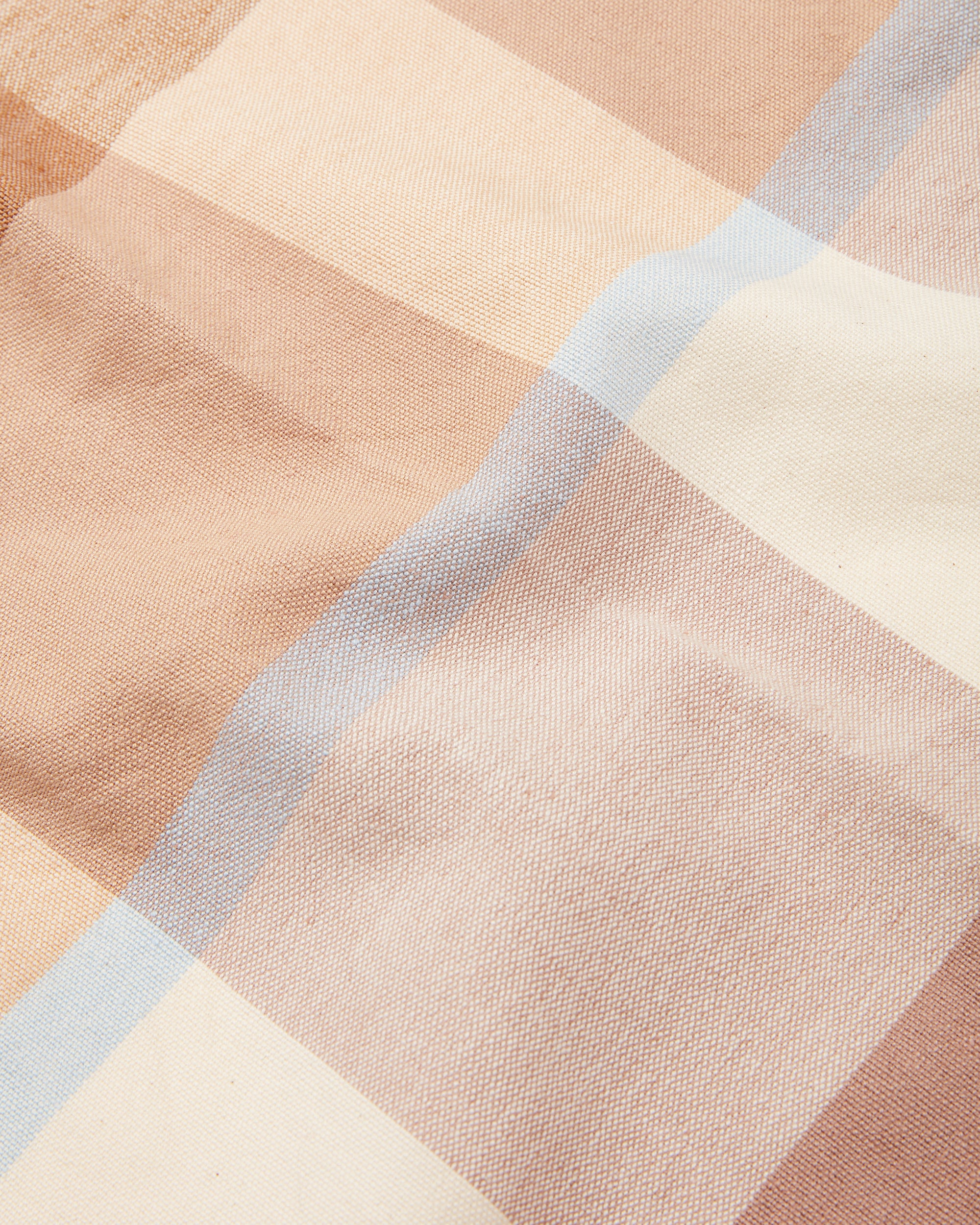 ethically handwoven MINNA table runner in oak, light blue, light brown