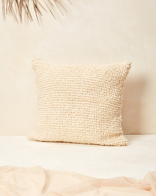 Ethically made, hand knit MINNA Cloud Pillow in 100% GOTS-certified organic cotton in a cream, off-white, oyster color. Decorative Throw Pillow