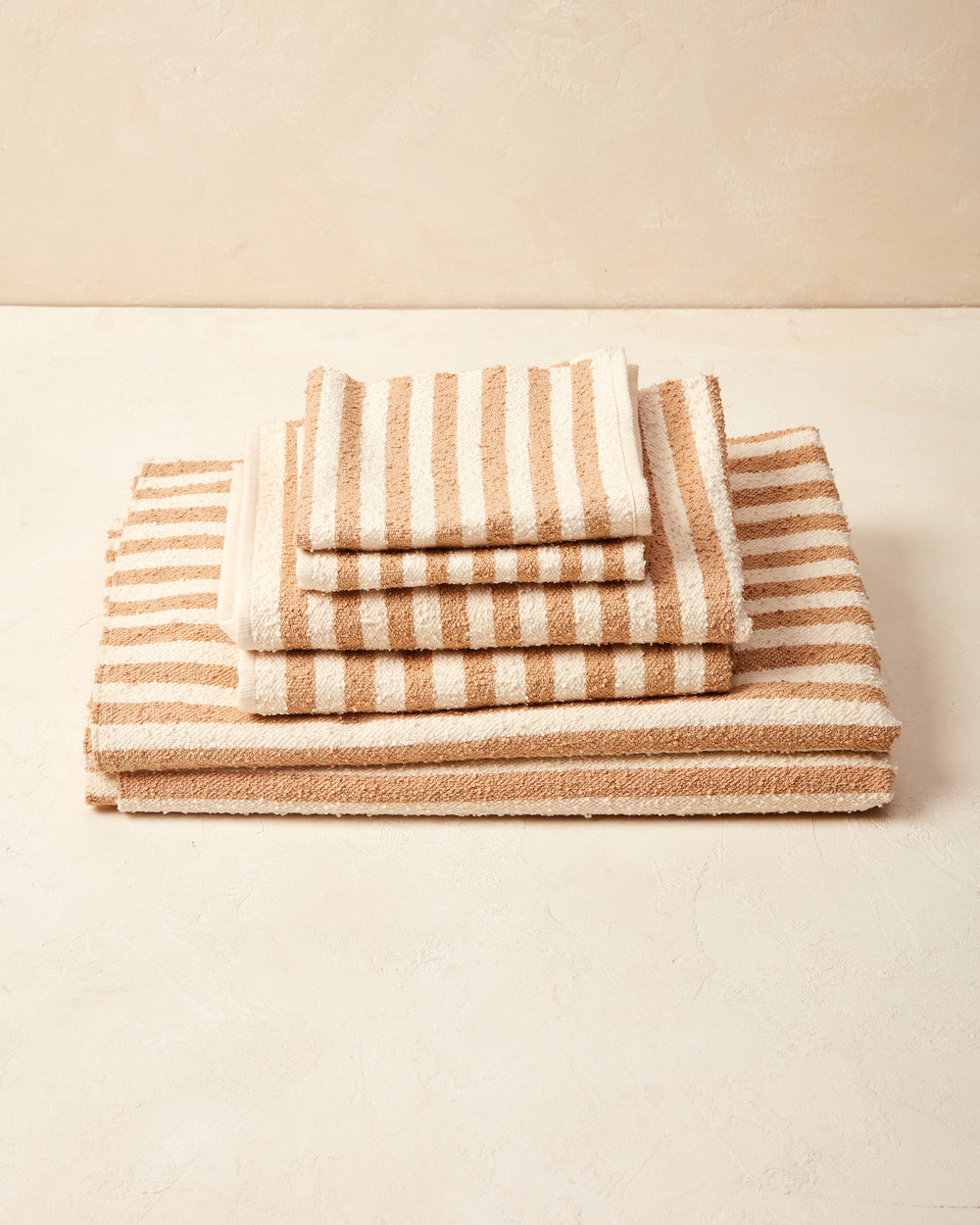 https://www.minna-goods.com/cdn/shop/files/Everyday-Towel-Set-Fawn-Stripe-styled-2_1000x.jpg?v=1688141550
