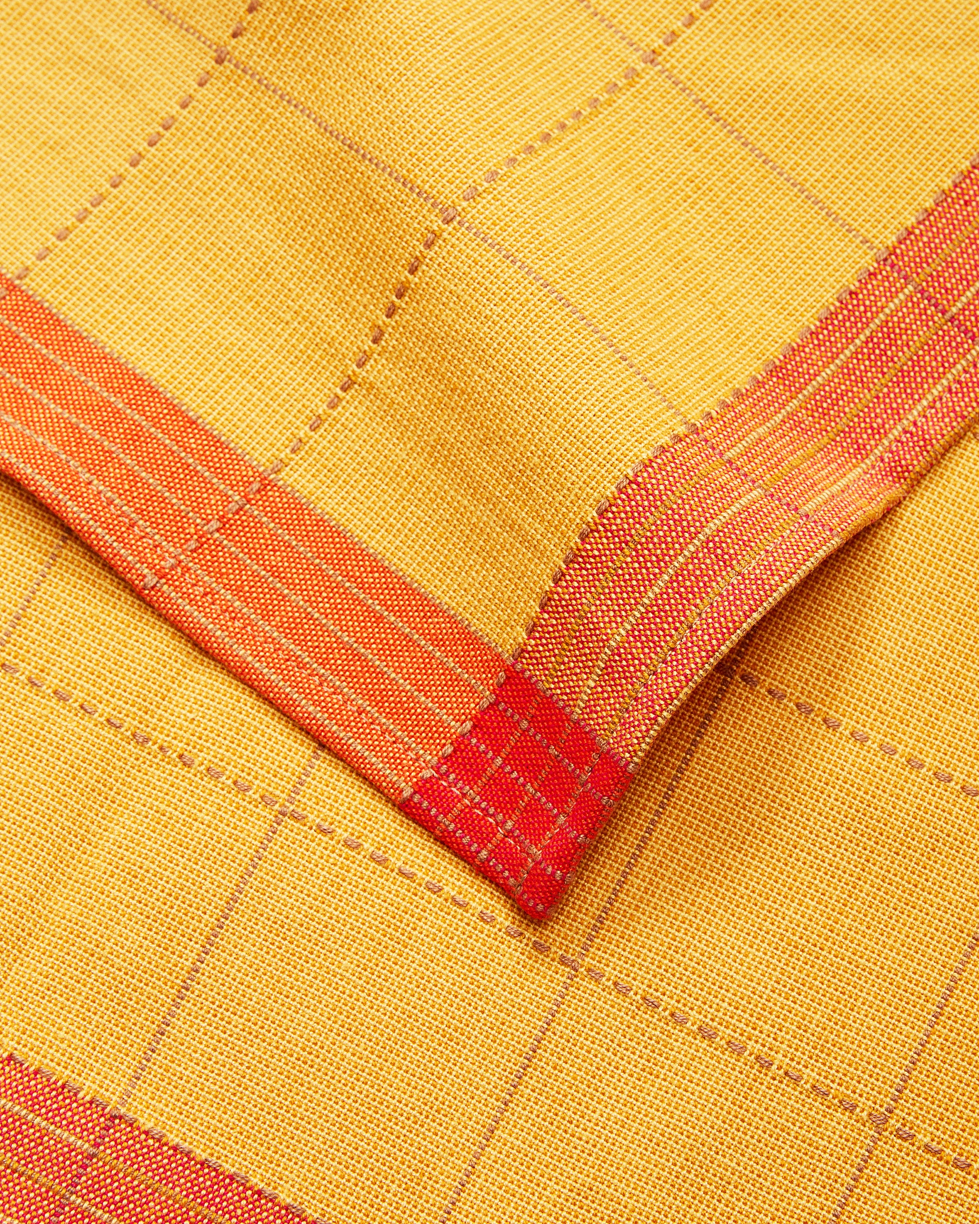 Ethically Handwoven Textile Cotton Napkin by MINNA - close-up of the Goldfinch bright yellow and orange colorway