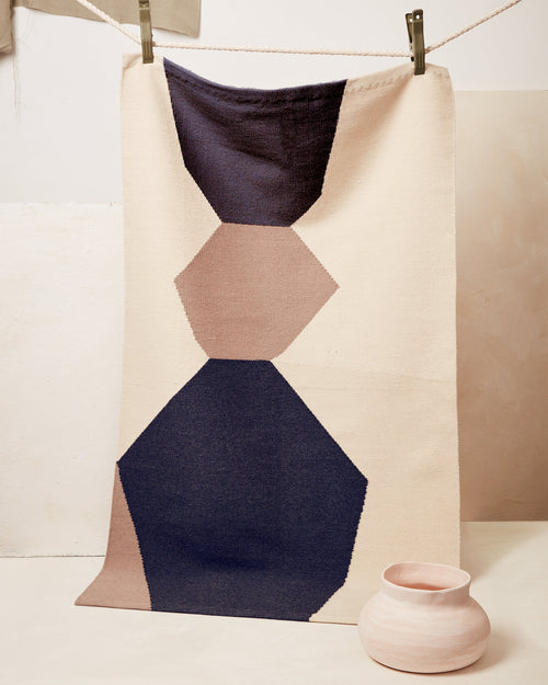 ethically handwoven MINNA flat weave rug in graphic patterns, dark blue, taupe, cream.