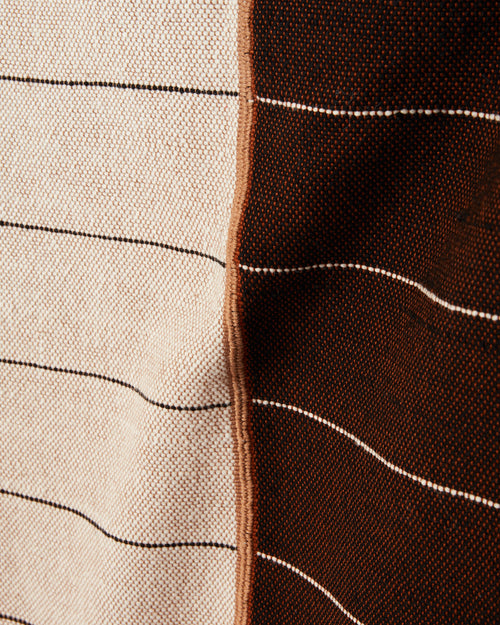 close up of MINNA agnes throw, cotton and naturally dyed wool