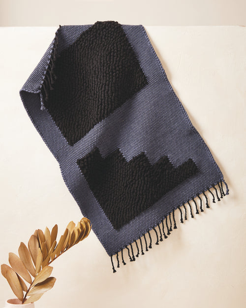 Ethically handwoven organic cotton MINNA bath mats in dark blue