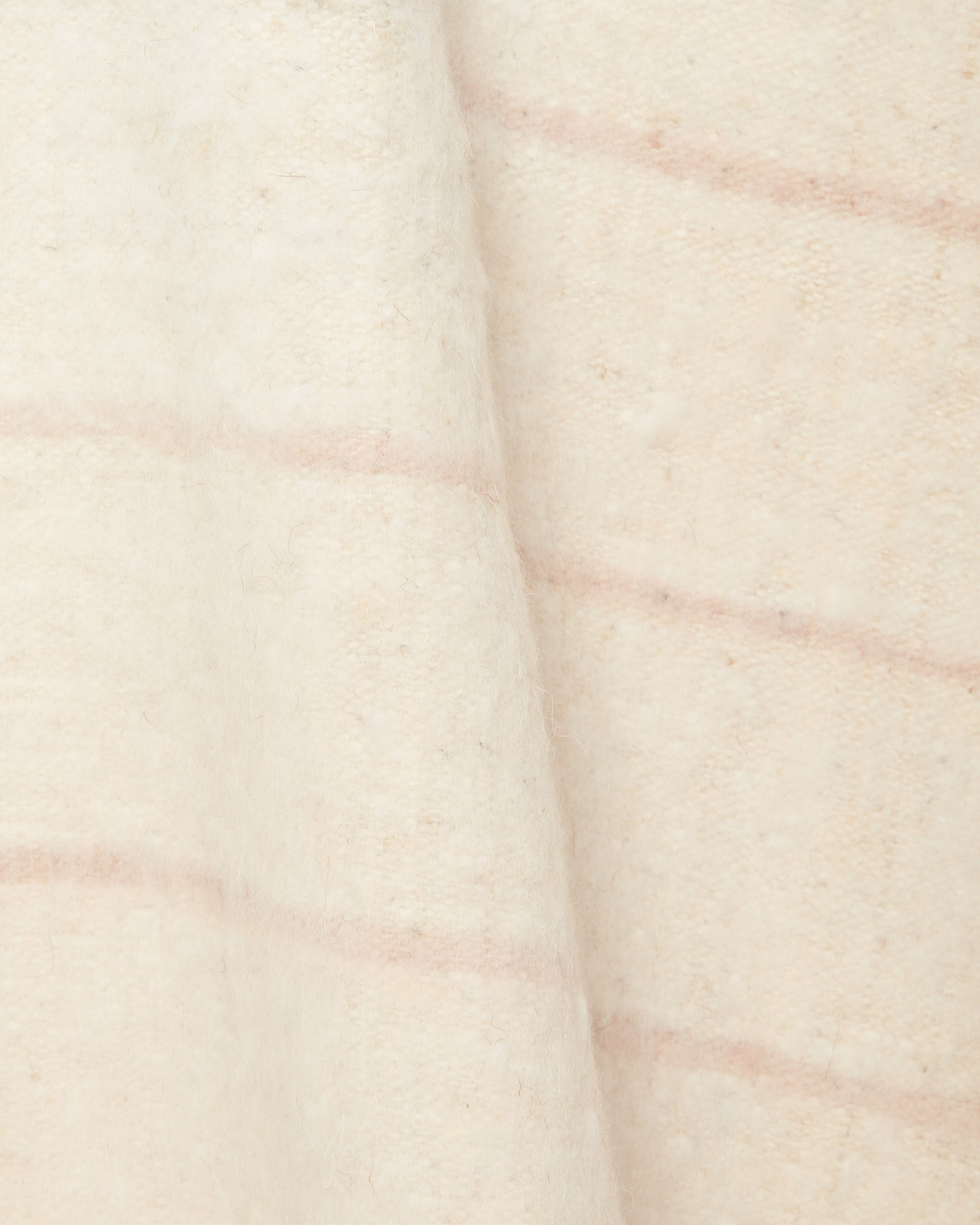 close up ethically handwoven brushed wool cozy warm throw MINNA neutral