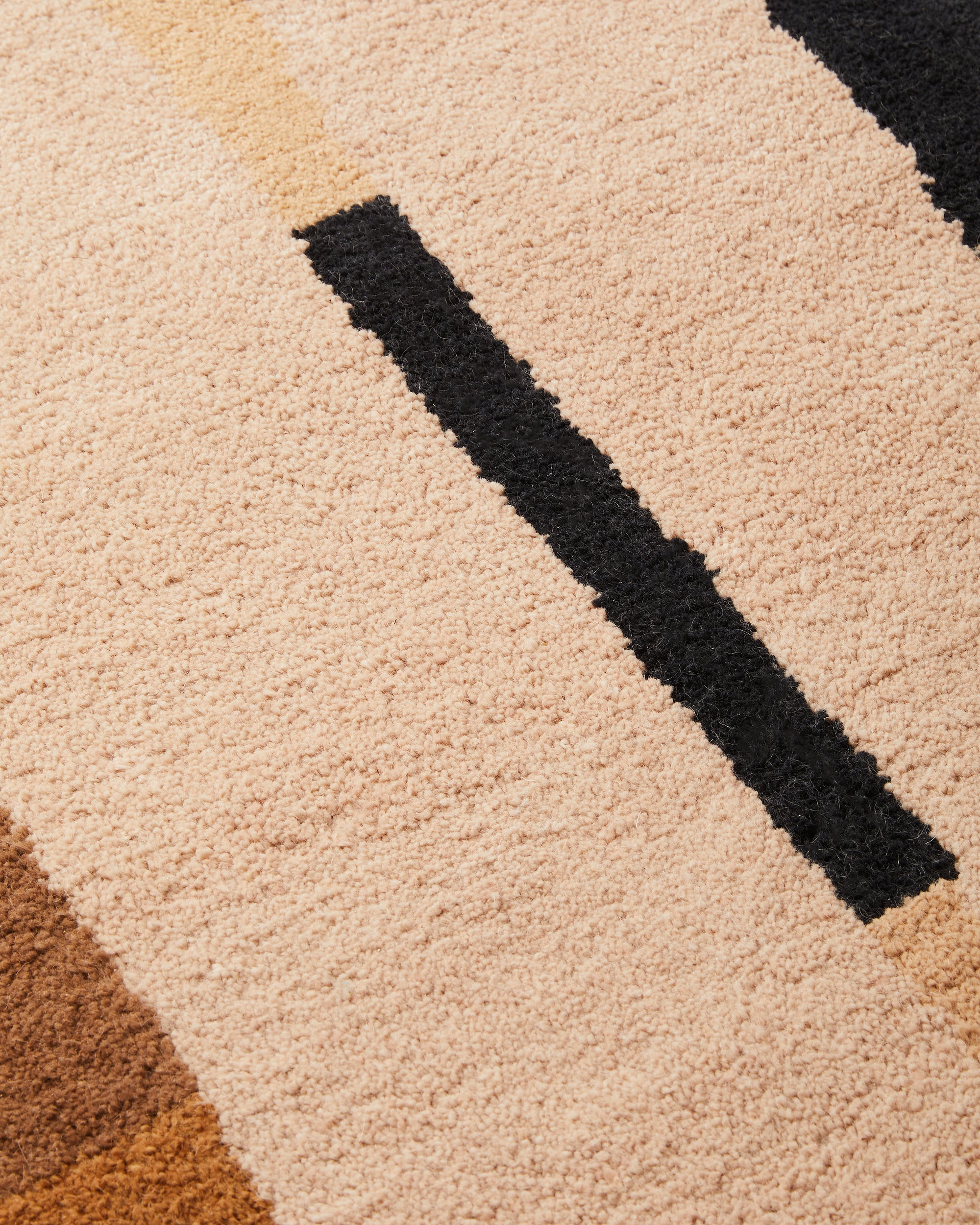 close-up of ethically handwoven plush pile weave MINNA Lines Pile Rug in Oat