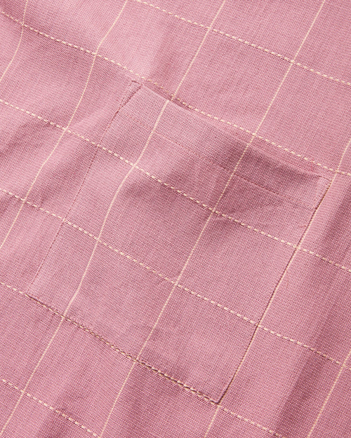 Close-up detail of handwoven ethically made Meridian Kitchen Apron by MINNA in Rosefinch, lilac color.