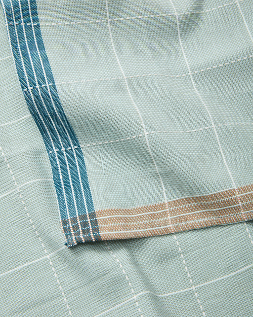 Details of Meridian Napkin in Jay by MINNA, ethically handmade woven cotton in light sky blue color