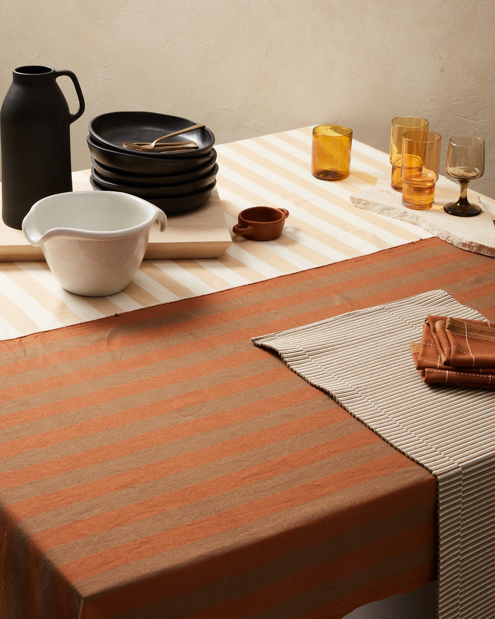 ethically handwoven cotton tablecloth with rust and yellow stripes by MINNA.