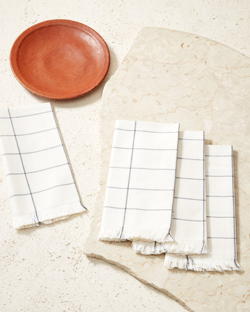 ethically handwoven minna napkins in cream grid pattern