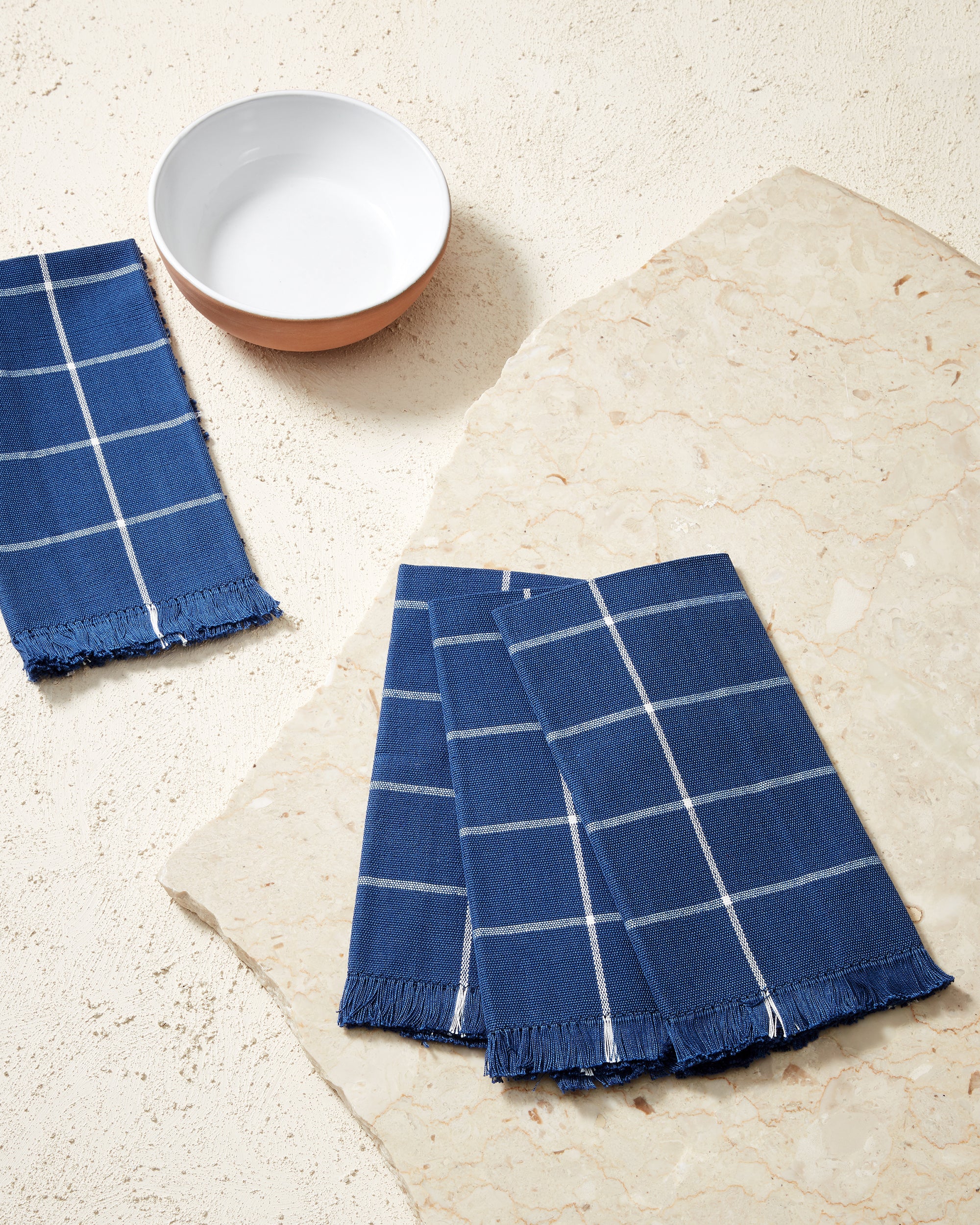 Ethically handwoven MINNA napkins in blue, indigo grid style pattern