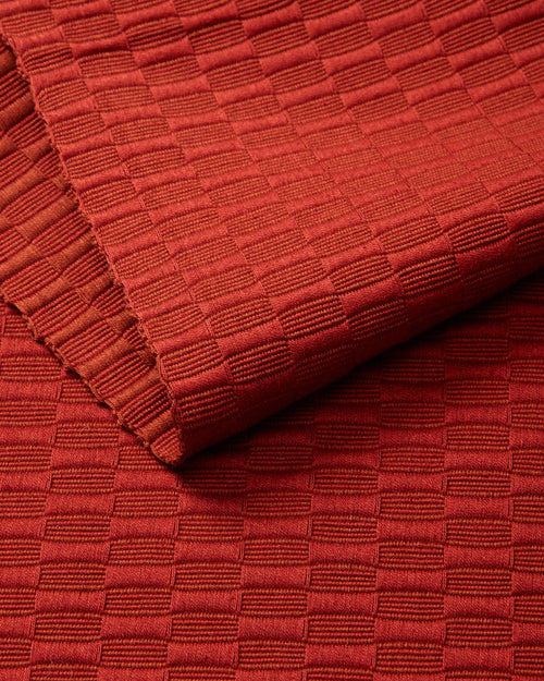 close-up detail ethically handwoven MINNA Panalito Rust table runner.