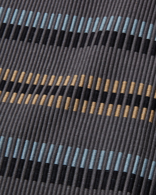 Handwoven tabletop textiles by MINNA contemporary and minimalist, placemat dark grey, blue, black