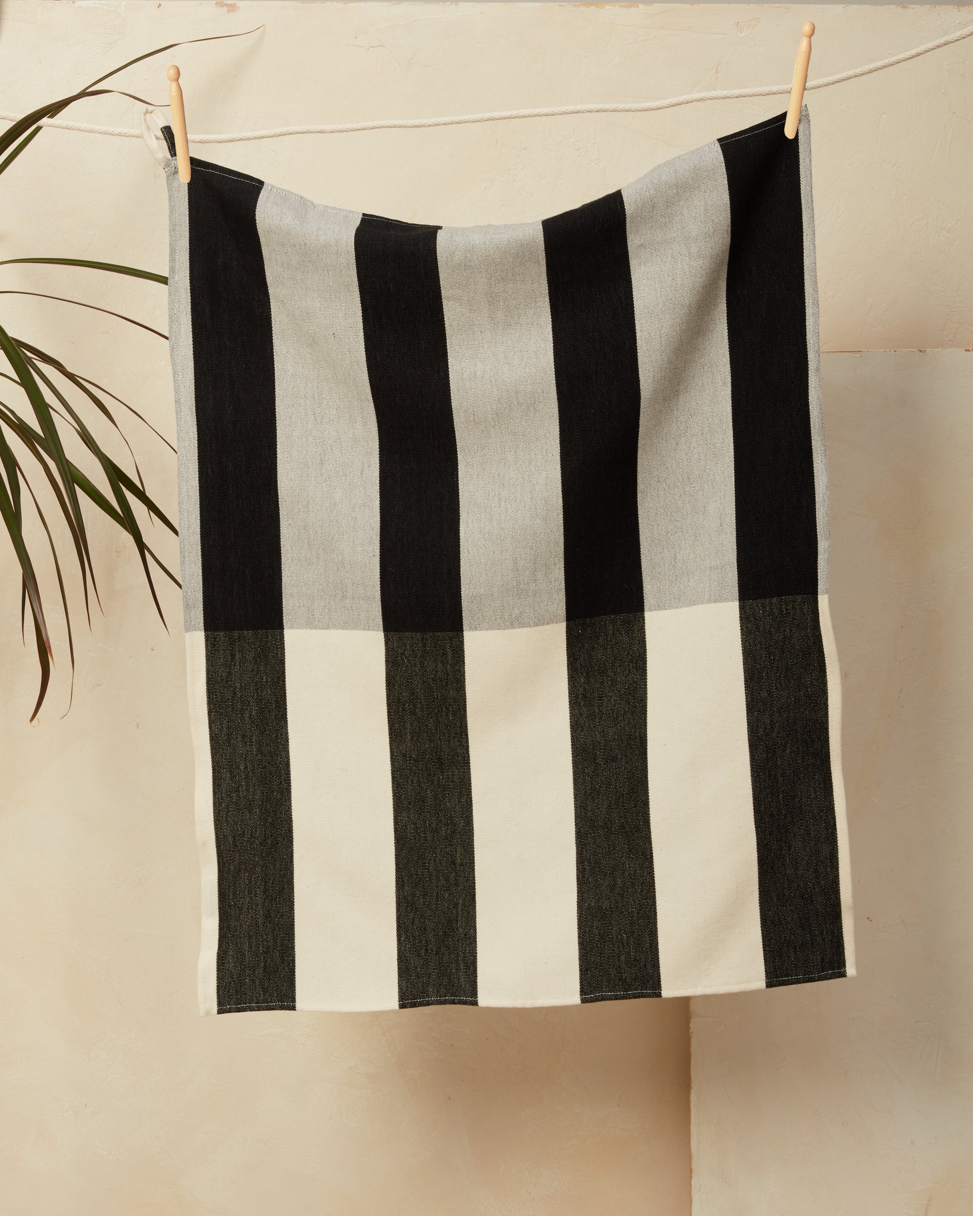 black and white striped tea towel, hand towel, kitchen towel. ethically handwoven cotton MINNA Sol Towel in Black.
