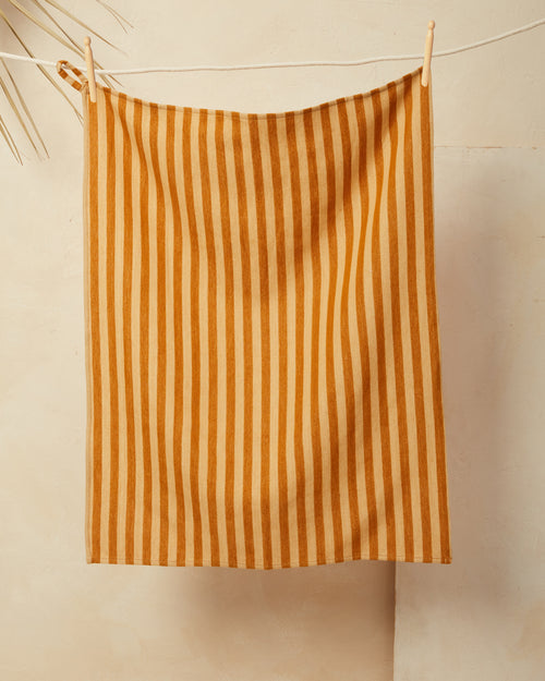 Ethically handmade cotton tea towel, kitchen towel, hand towel, in gold yellow stripe. MINNA Sol Towel in Honey.