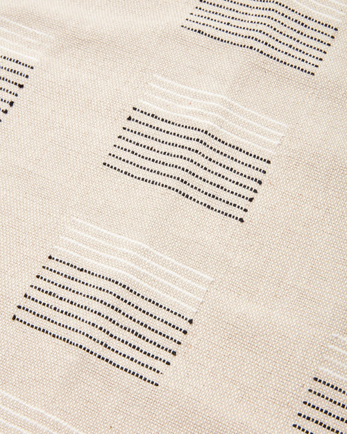 a close-up detail of ethically handwoven oeko-tex cotton MINNA napkin with textural, overshot weaving pattern