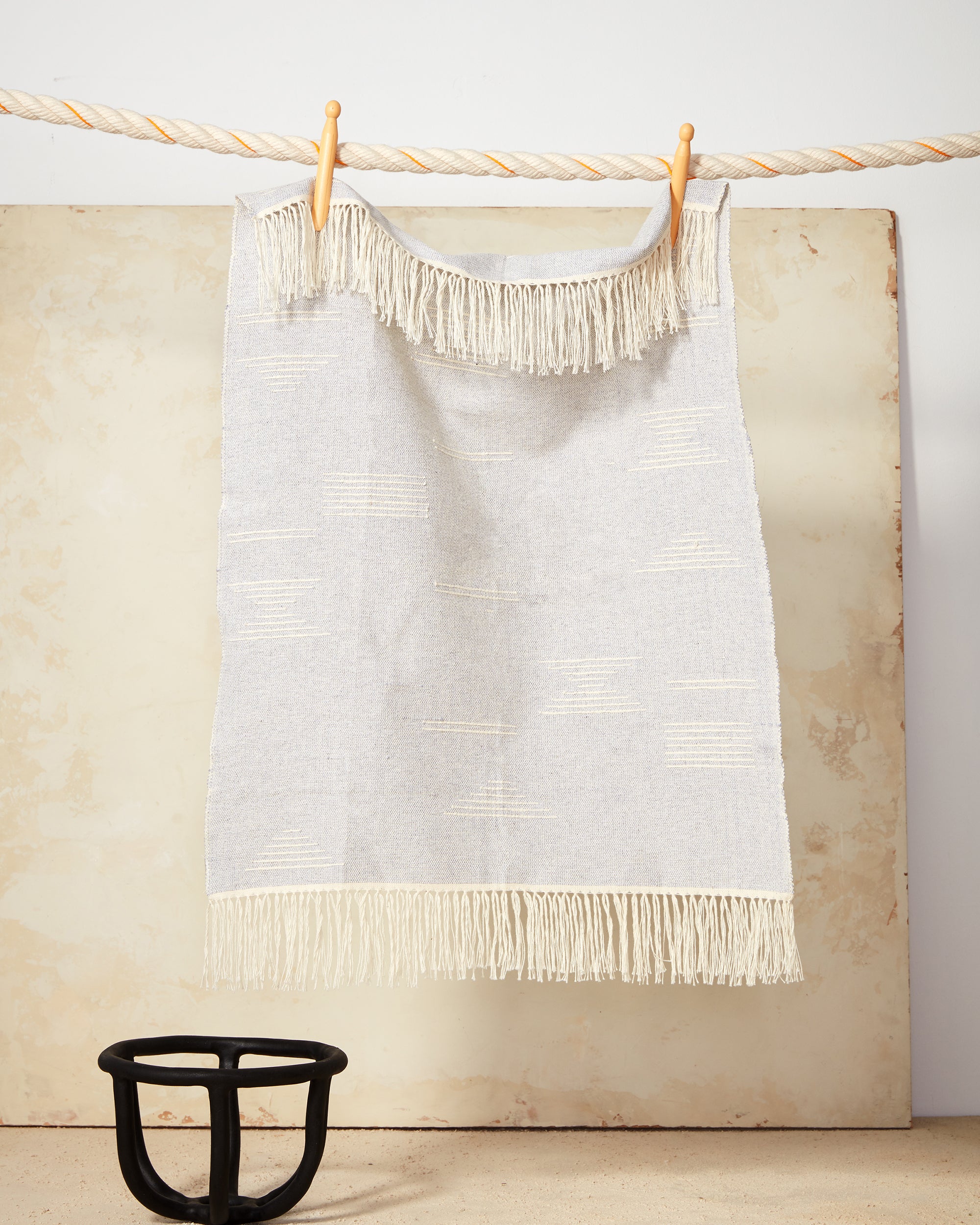 Ethically handwoven cotton tea towel by MINNA with abstract geometric shapes.