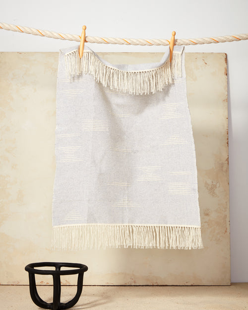 Ethically handwoven cotton tea towel by MINNA with abstract geometric shapes.