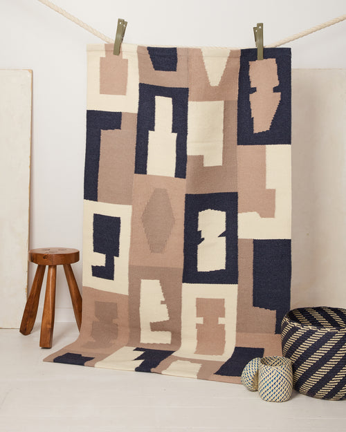 MINNA Vessels Rug, ethically handwoven wool graphic area rug. Blue, beige, taupe, cream.